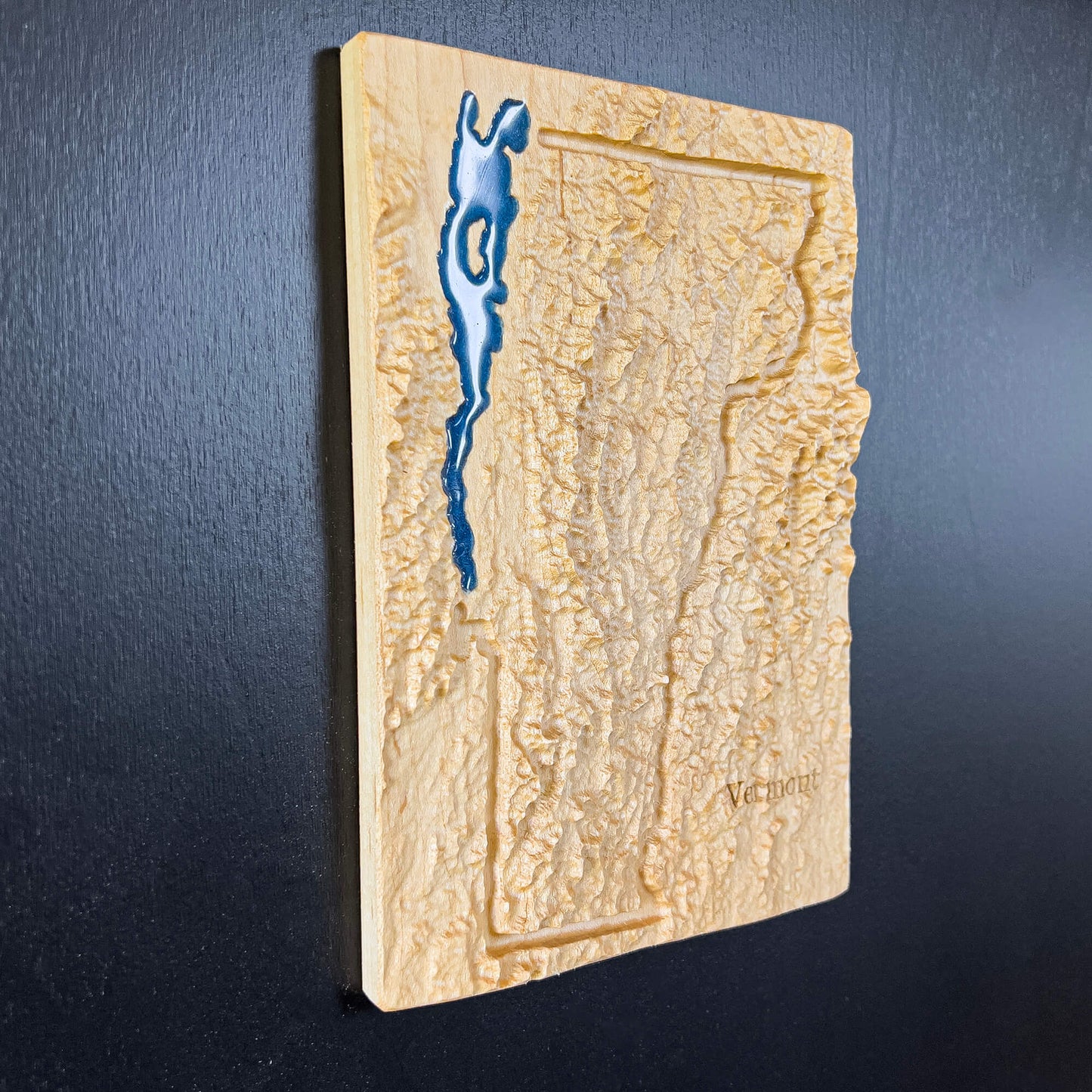 Vermont State map carved in wood with Lake Champlain feature in blue epoxy