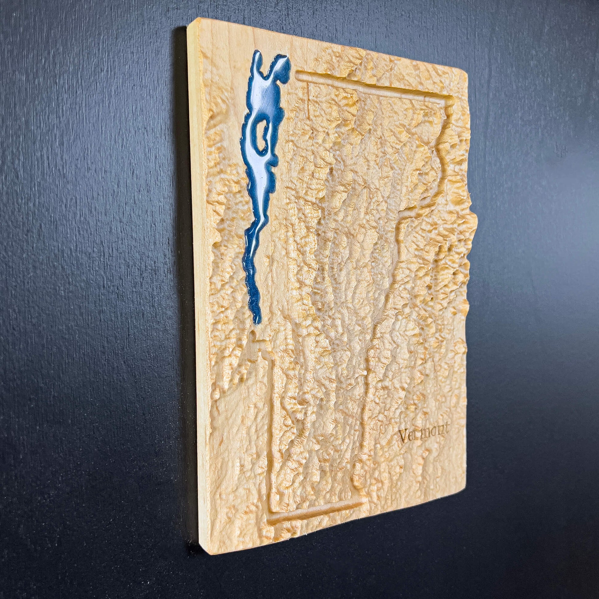 Vermont State map carved in wood with Lake Champlain feature in blue epoxy