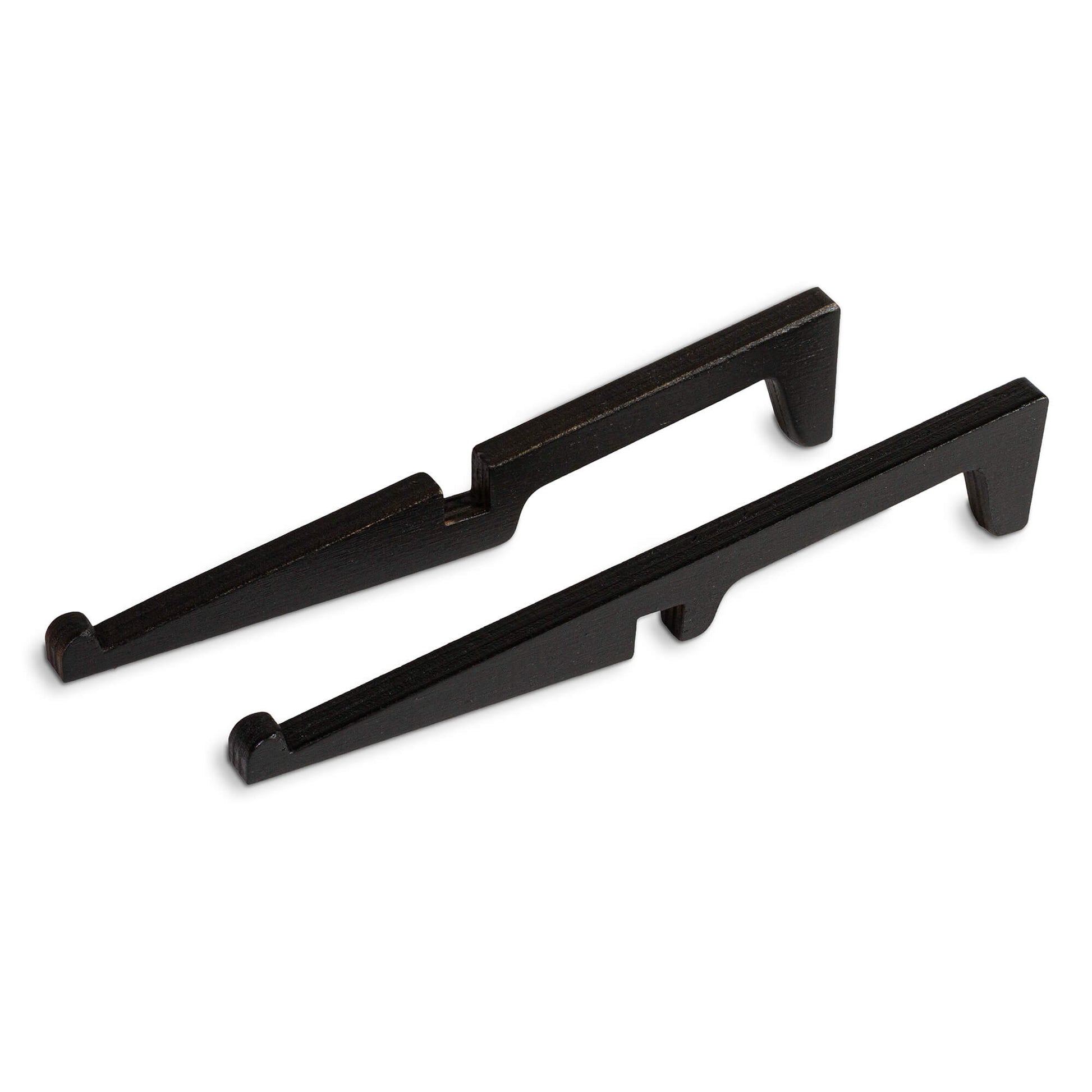 two laser cut long wood shapes which when put together create a stand for a wooden map