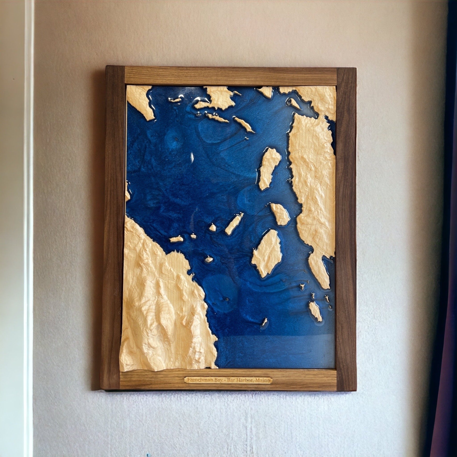 3d wooden topo map of frernchman bay and bar harbor maine framed hanging on a white wall 