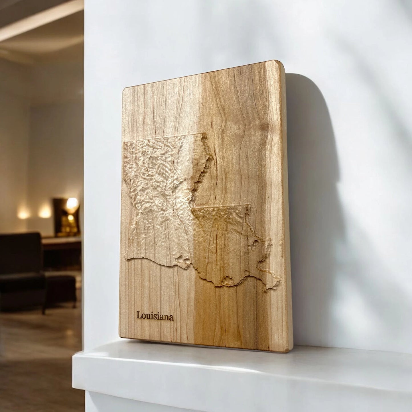 topographic Wooden map of Louisiana state design on a white surface