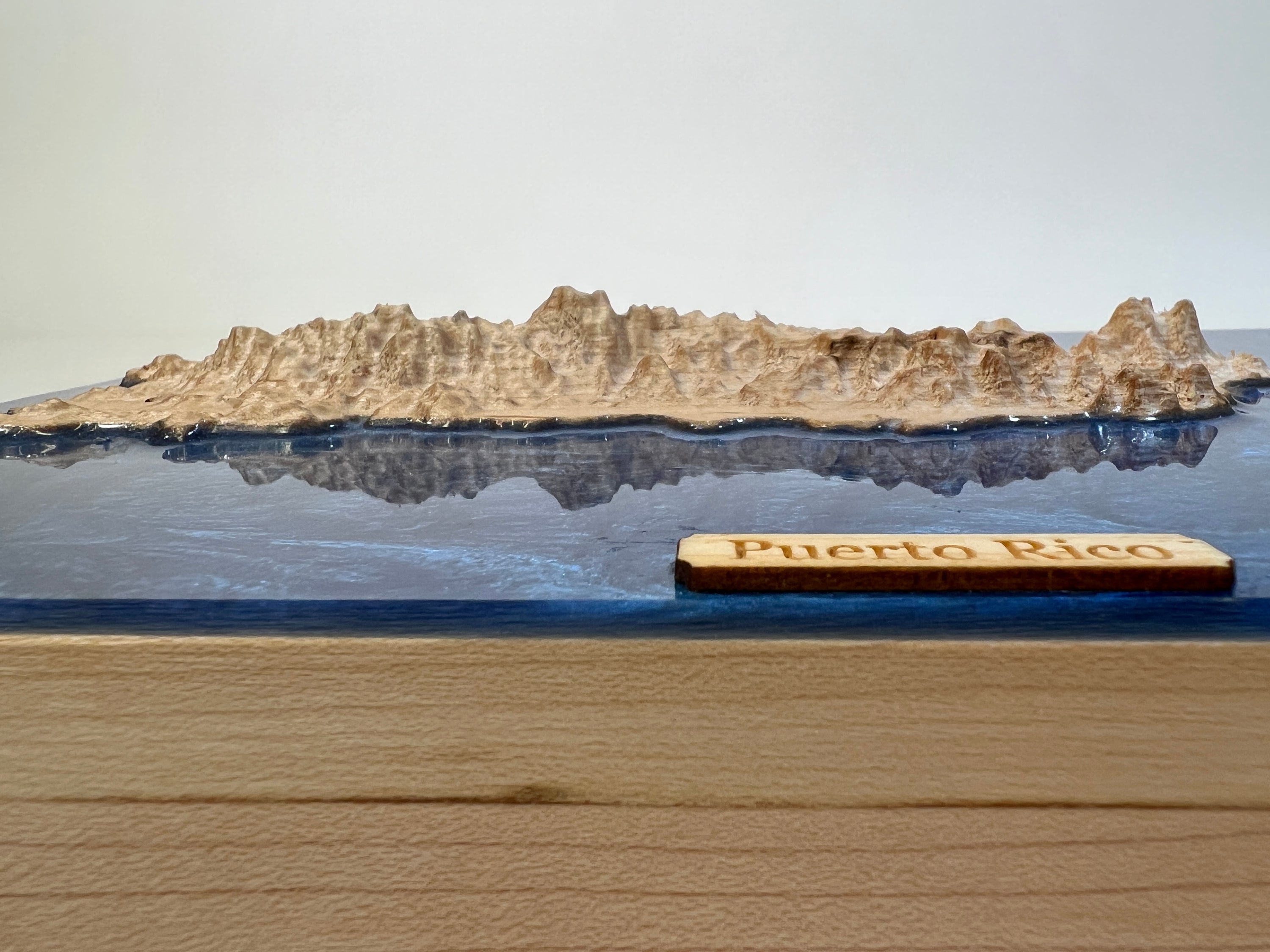 low angle perspective of a wooden topographic map of puerto rico