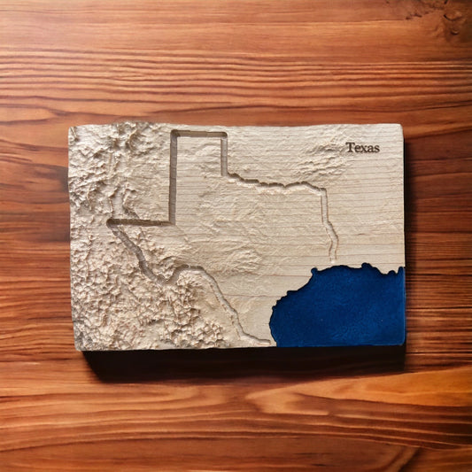 Wooden map of Texas on a wooden surface