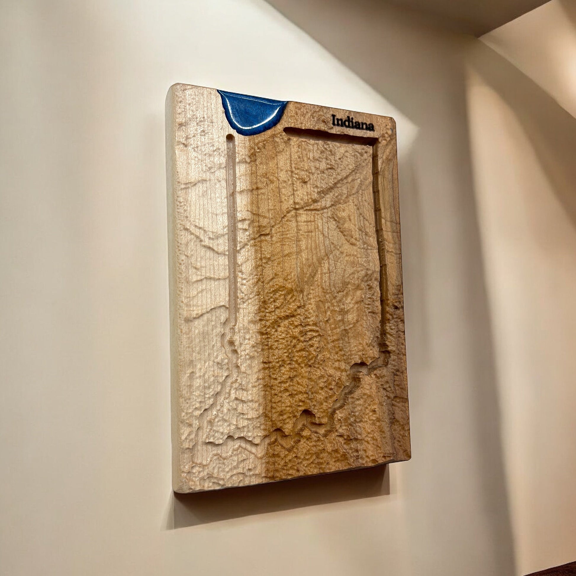 topographic Wooden map of Indiana on a wall